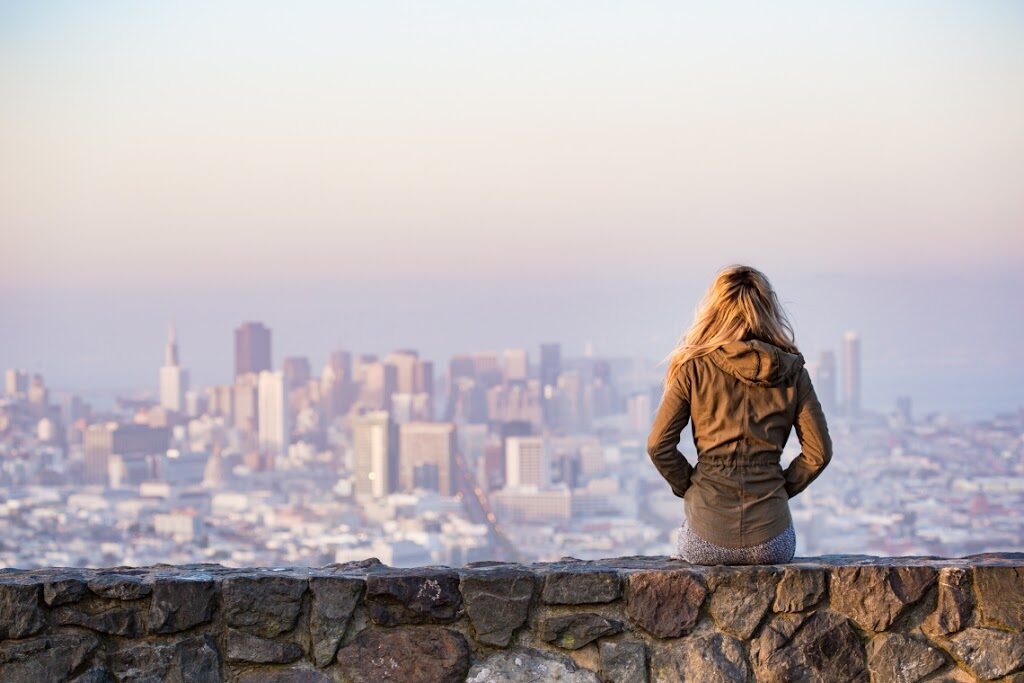 A woman looking out to the city