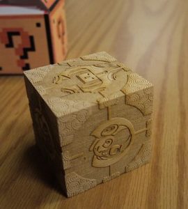 A cube with carved designs